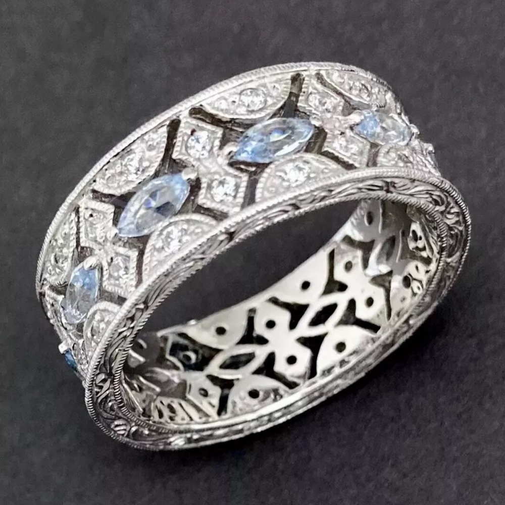 Tacori beautiful intricate eternity band size 11 with marquise topaz silver